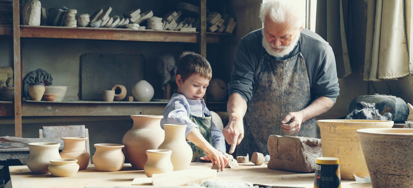 Grandfather and grandson pottery making - By Vitaly Gariev