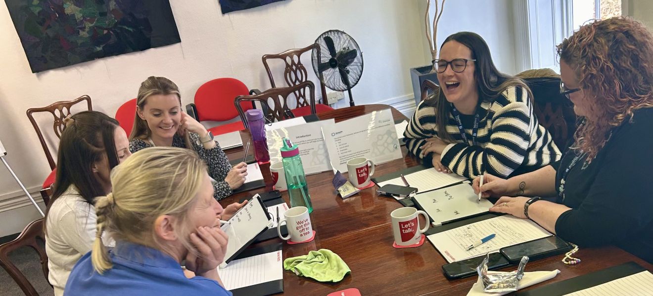 Photo of dementia interpreters having a discussion