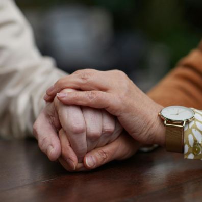 Couple holding hands